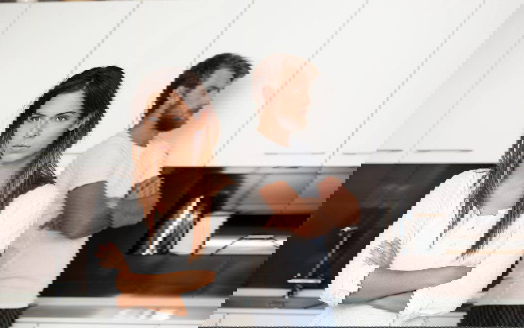 Displeased woman arguing with partner and wondering if bad behaviour will affect their divorce settlement