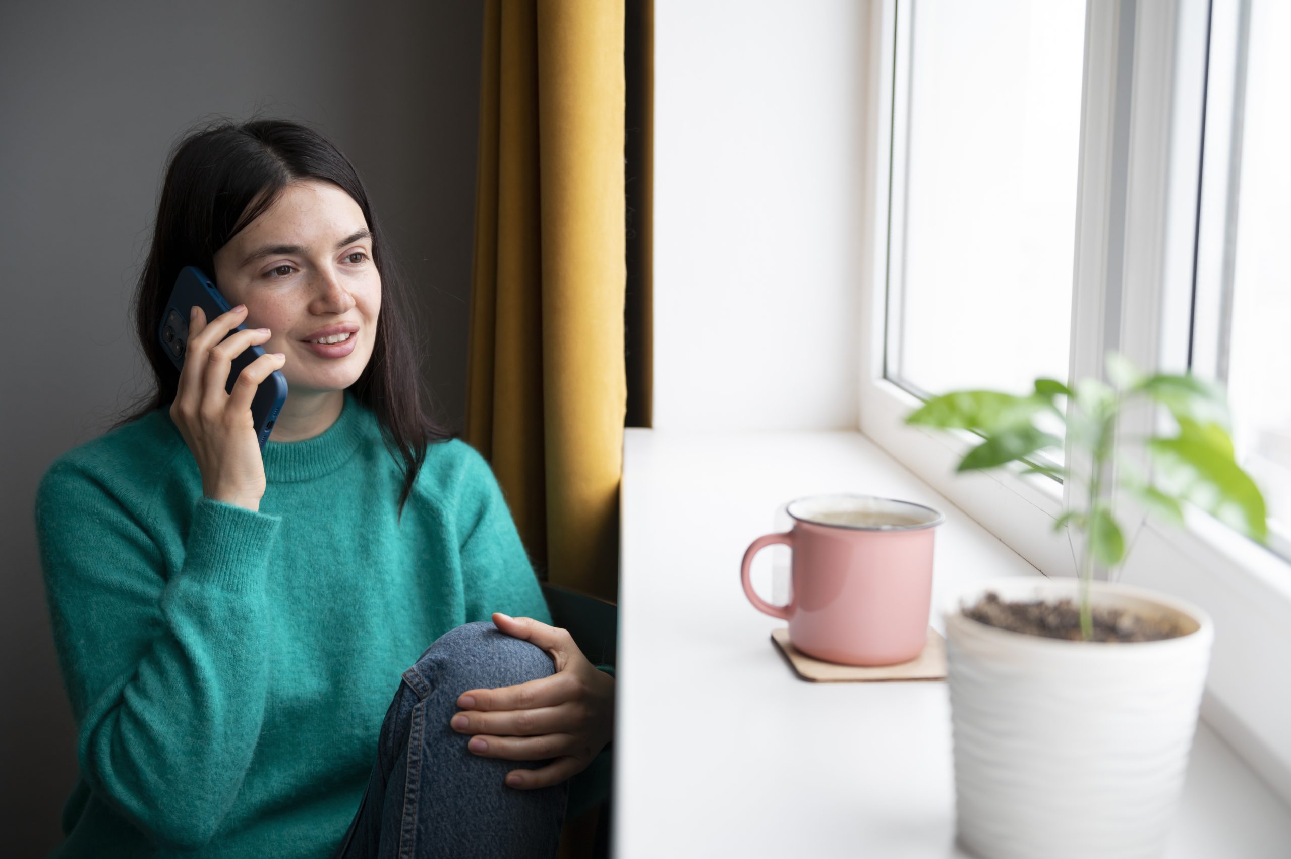 woman talking on the phone considering getting a financial order in place