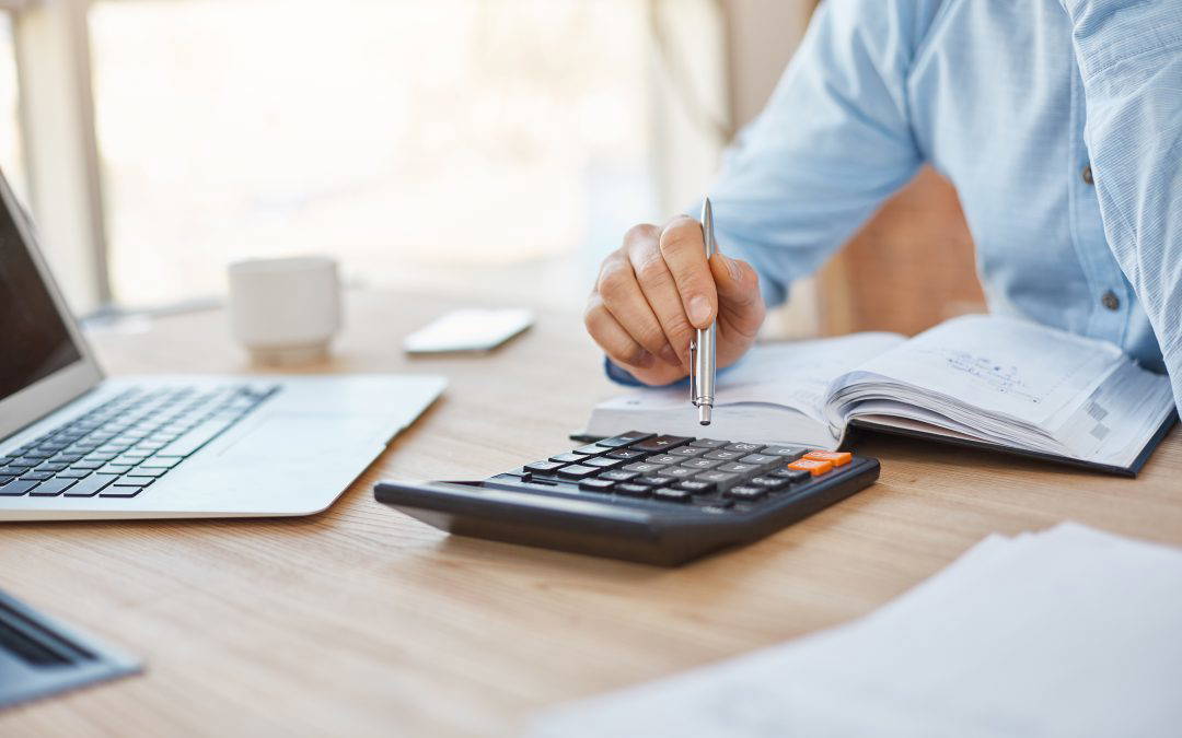 Close up of man arranging finances without getting a divorce