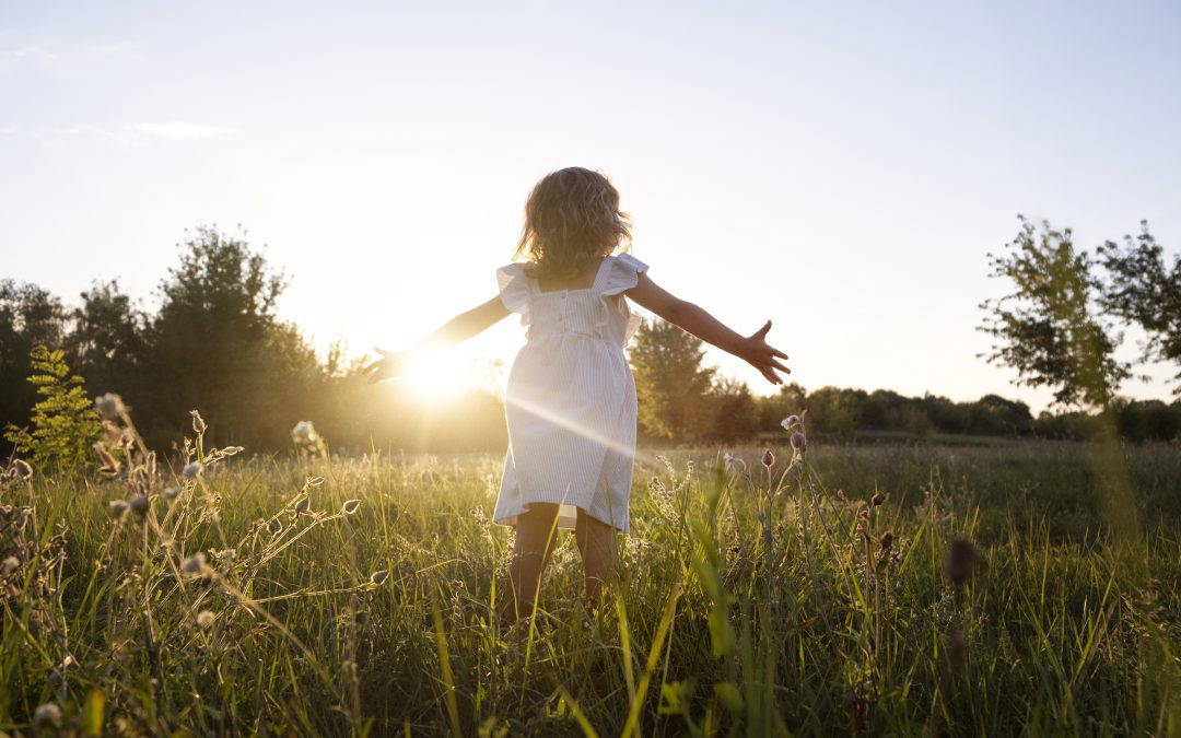 child outdoors having great time after court decides who child lives with