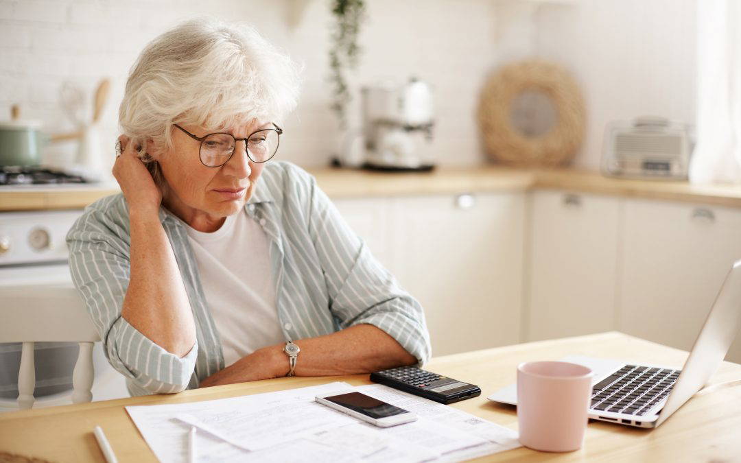 unhappy looking woman getting a divorce now discussing pension sharing